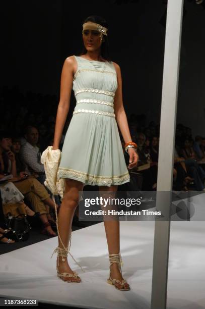 Model displays a creation by fashion designer Surily Goel during the Wills Lifestyle India Fashion Week at Pragati Maidan, on September 7, 2007 in...