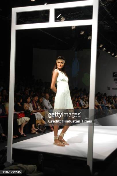 Model displays a creation by fashion designer Surily Goel during the Wills Lifestyle India Fashion Week at Pragati Maidan, on September 7, 2007 in...