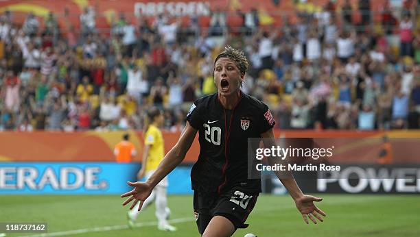 Abby Wambach of USA celebrates after scoring her team's equalizing goal during the FIFA Women's World Cup 2011 Quarter Final match between Brazil and...