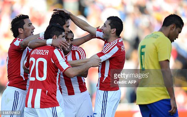 Paraguayan forward Roque Santa Cruz is seen celebrating with teammates Lucas Barrios , Nestor Ortigoza , Antolin Alcaraz and Antolin Alcaraz after...