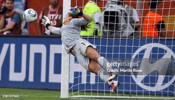 Hope Solo, goalkeeper of USA saves a penalty during penalty shoot out during the FIFA Women's World Cup 2011 Quarter Final match between Brazil and...