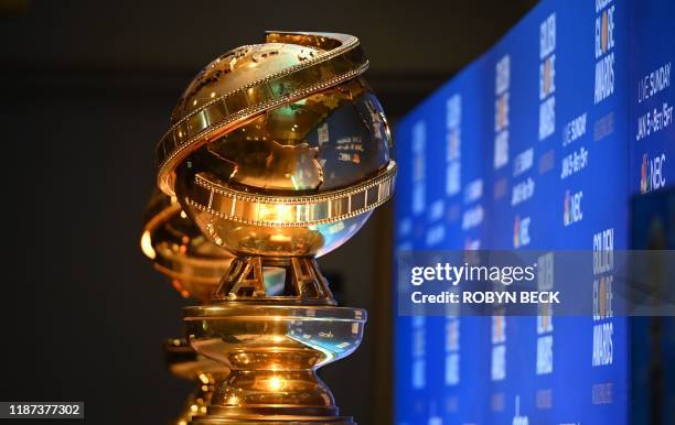 Golden Globe trophies are set by the stage ahead of the 77th Annual Golden Globe Awards nominations announcement at the Beverly Hilton hotel in...