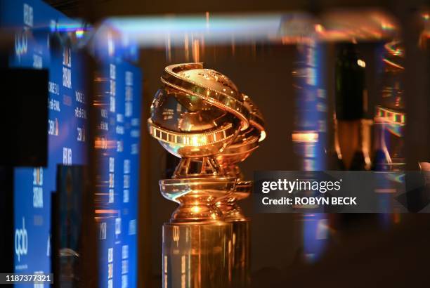 Golden Globe trophies are set by the stage ahead of the 77th Annual Golden Globe Awards nominations announcement at the Beverly Hilton hotel in...