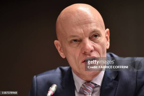 World Anti-Doping Agency Director for Intelligence and Investigations Gunter Younger speaks during a press conference on December 9, 2019 in Lausanne...