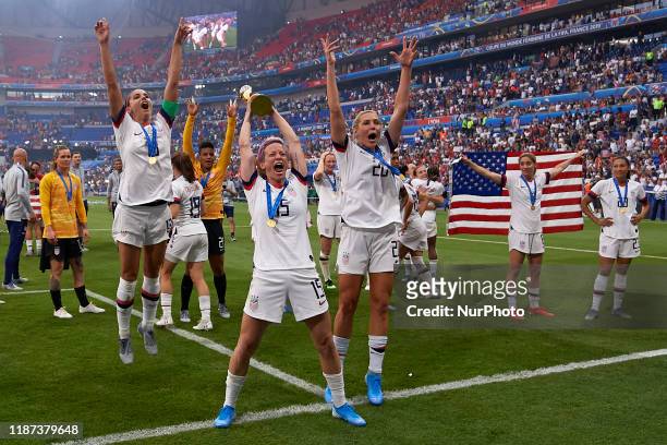 Megan Rapinoe and Alex Morgan of United States celebrate whit her teammates after winning the 2019 FIFA Women's World Cup France Final match between...