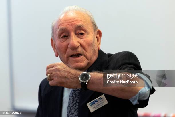 Holocaust survivor, Joseph Alexander, shows the number tattooed on his arm by the Nazis when he arrived in the Auschwitz concentration camp. Burbank,...