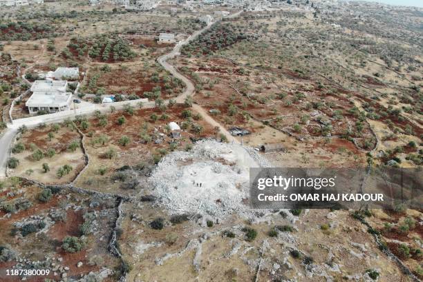 An aerial view taken on November 1 shows the site where the Islamic State group leader Abu Bakr al-Baghdadi was reportedly killed according to US...