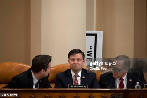 Rep. Matt Gaetz , Rep. Mike Johnson and Rep. Andy Biggs speak to each other during testimony by lawyers for the House Judiciary Committee, Barry...