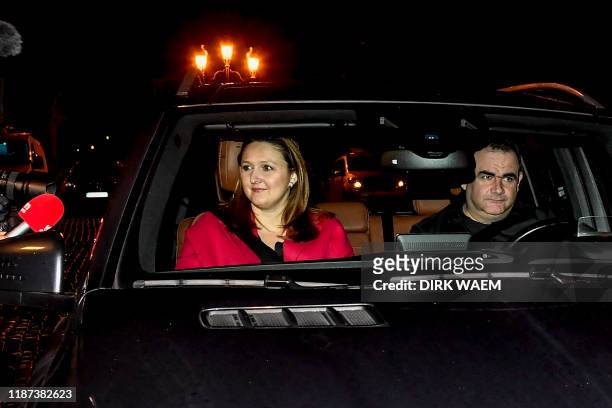 Flemish liberal Open Vld party chairwoman Gwendolyn Rutten arrives by car for a meeting with the King at the Royal Palace in Brussels on December 9...