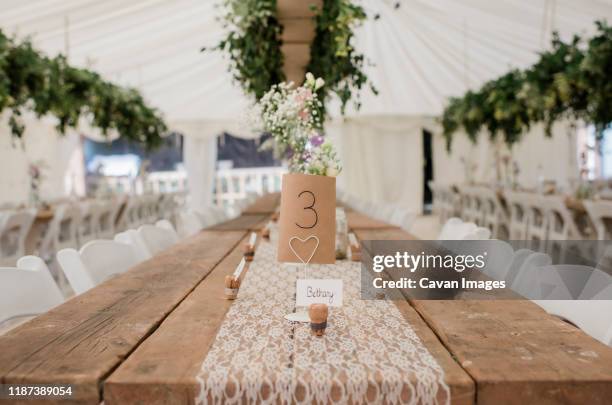 place number for wedding table decoration - table numbers stock-fotos und bilder