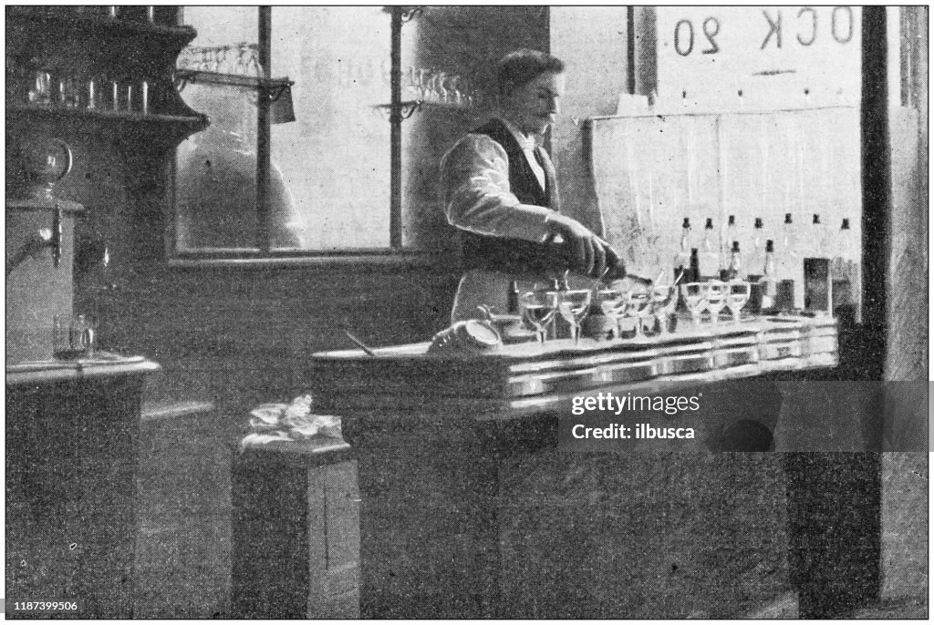 Antique photo: Barman serving drinks