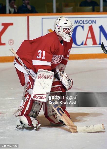 Alain Chevrier of the Detroit Red Wings skates against the Toronto Maple Leafs during NHL game action on February 2, 1991 at Maple Leaf Gardens in...