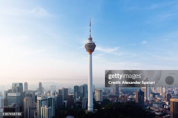 aerial view of kuala lumpur skyline with kl tower, malaysia - menara kuala lumpur tower stockfoto's en -beelden