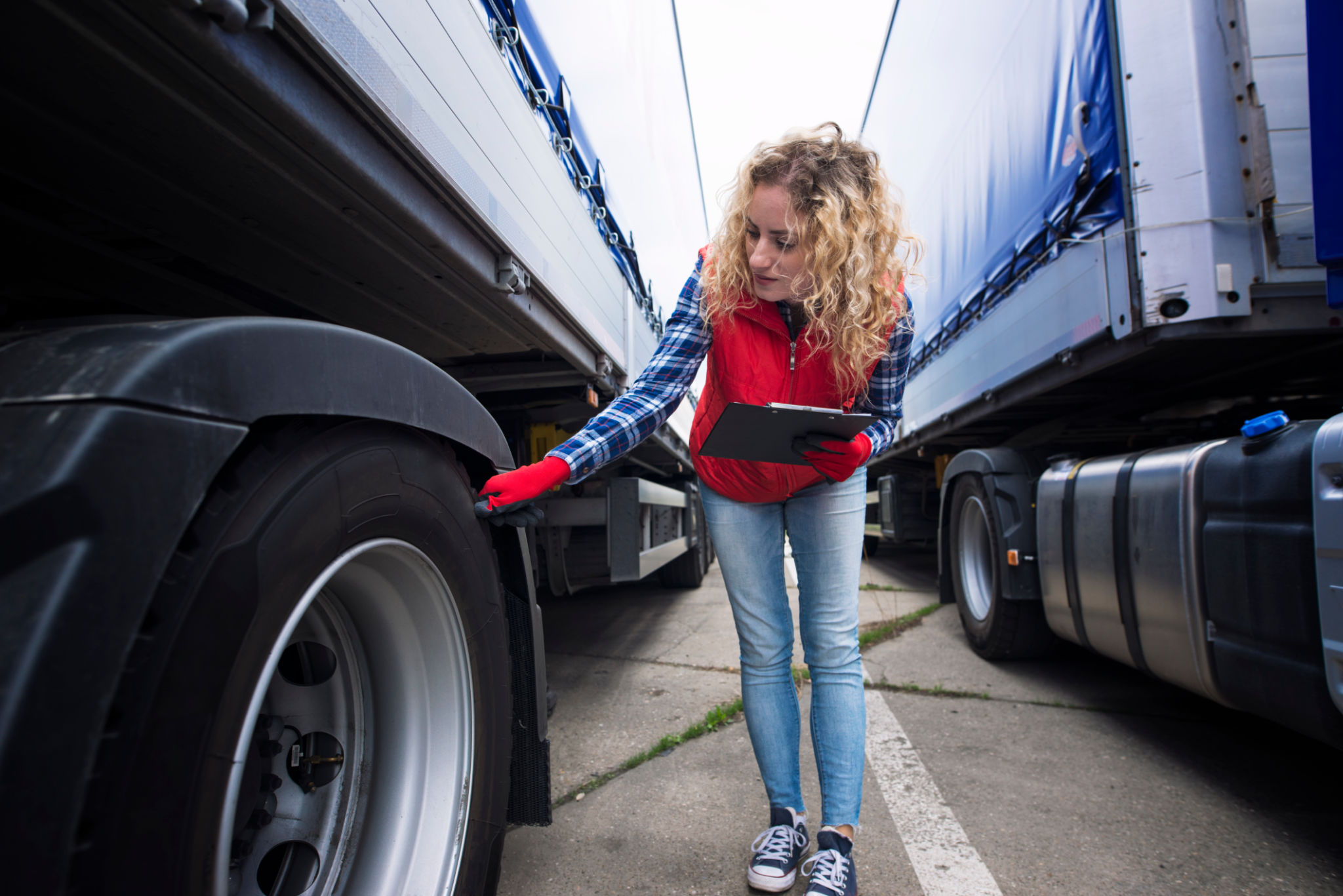 Checking tires. Truck transportation. Checking tires. Truck transportation.