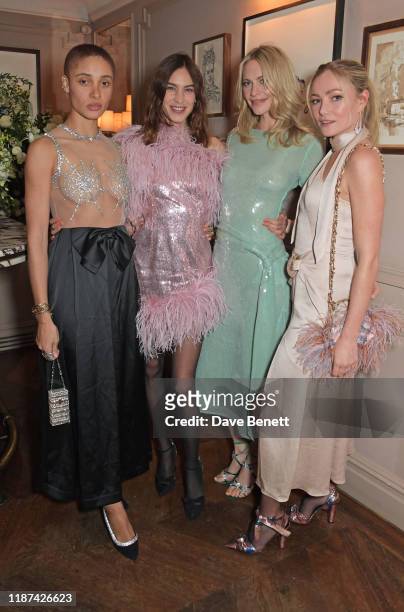 Adwoa Aboah, Alexa Chung, Poppy Delevingne and Clara Paget attend an intimate dinner hosted by Edward Enninful and Anne Mensah in celebration of the...