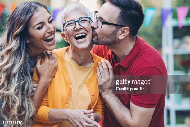 happy mother-in-law with young family - sogra imagens e fotografias de stock