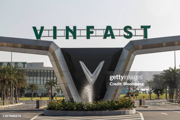 Signage for Vinfast stands at an entrance to the automakers factory in Haiphong, Vietnam, on Wednesday, Dec. 4, 2019. Vingroup JSC Chairman Vuong,...