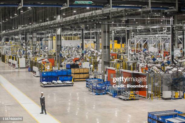 Robots arms stand in the body shop area of the Vinfast factory in Haiphong, Vietnam, on Wednesday, Dec. 4, 2019. Vingroup JSC Chairman Vuong, the...