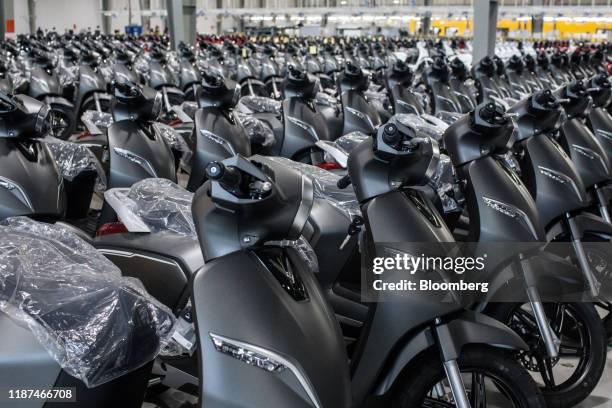Vinfast Klara electric scooter sit at the automaker's factory in Haiphong, Vietnam, on Wednesday, Dec. 4, 2019. Vingroup JSC Chairman Vuong, the...