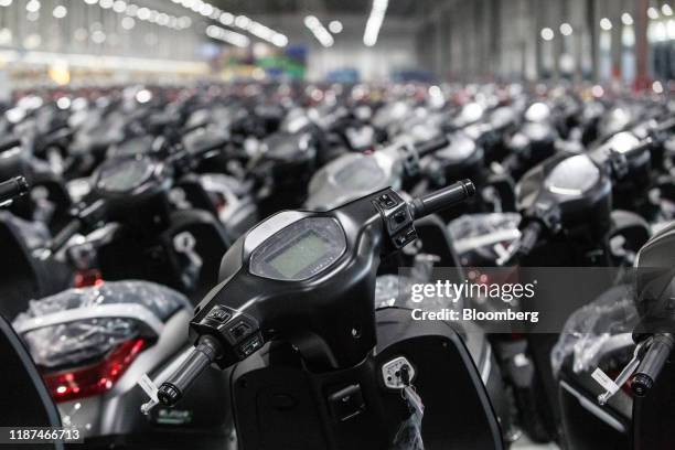 Vinfast Klara electric scooter sit at the automaker's factory in Haiphong, Vietnam, on Wednesday, Dec. 4, 2019. Vingroup JSC Chairman Vuong, the...