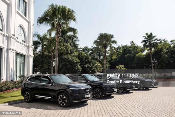 The Motorcade of Vingroup JSC Chairman Pham Nhat Vuong sits parked outside the company's headquarters in Hanoi, Vietnam, on Thursday, Dec. 5, 2019....