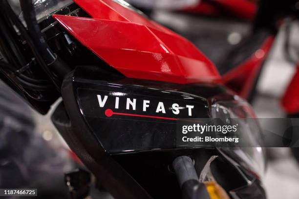 Vinfast logo is displayed on an Impes electric scooter sit at the automaker's factory in Haiphong, Vietnam, on Wednesday, Dec. 4, 2019. Vingroup JSC...