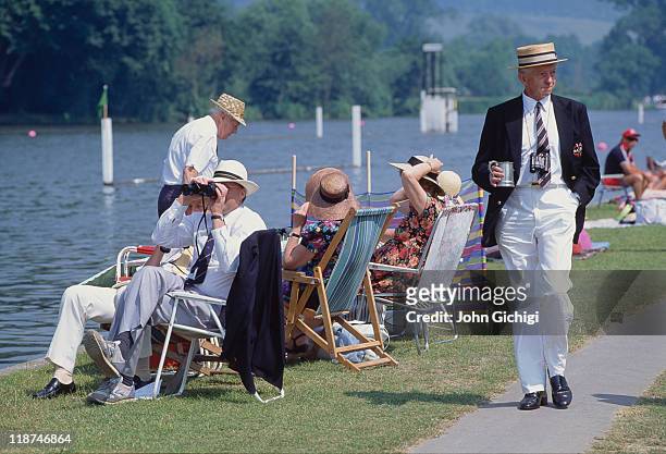 Spectators on the riverbank at Henley Royal Regatta, Henley-on-Thames, Oxfordshire, 1993.