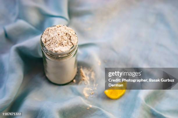 collagen powder and a slice of lemon; vitamin c - translucent gelatin stock pictures, royalty-free photos & images