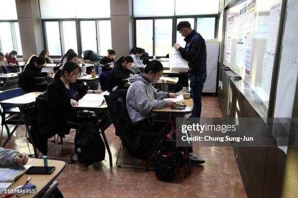 South Korean students take their College Scholastic Ability Test at a school on November 14, 2019 in Seoul, South Korea. More than 540,000 high...