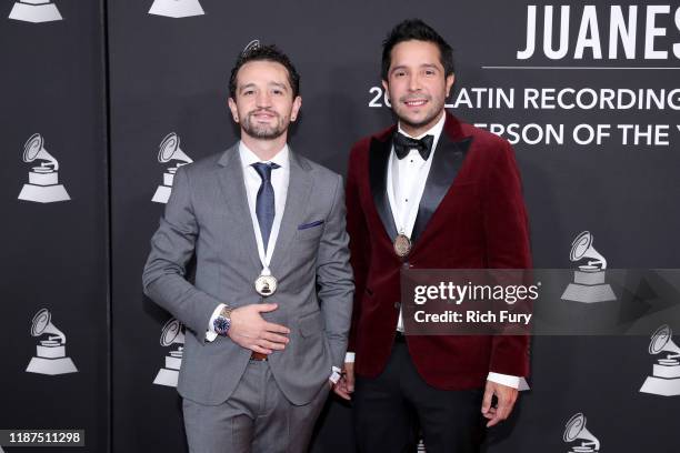 Andres Torres and Mauricio Rengifo attend the Latin Recording Academy's 2019 Person of the Year gala honoring Juanes at the Premier Ballroom at MGM...