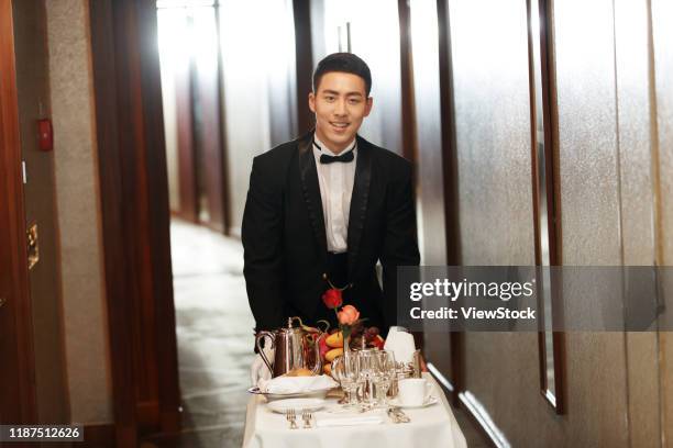 the hotel waiter - chinese waiter stock pictures, royalty-free photos & images