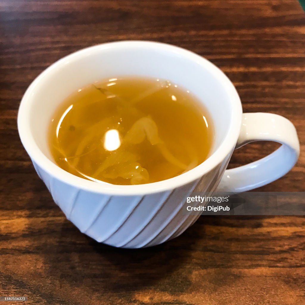 Vegetable consommé soup cup