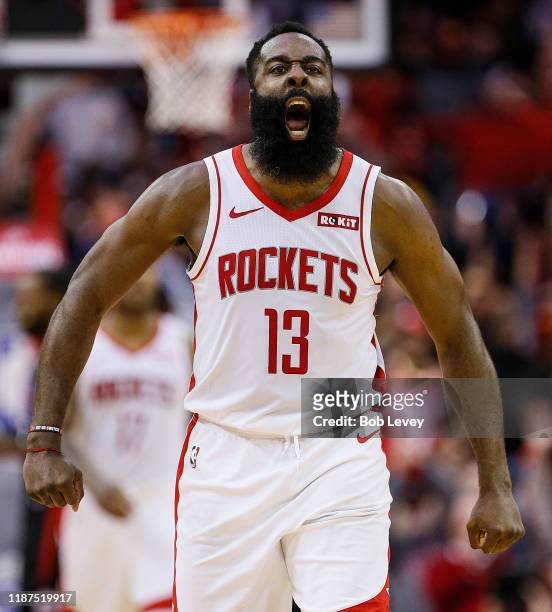 James Harden of the Houston Rockets reacts after hitting a three point shot against the Los Angeles Clippers during the fourth quarter at Toyota...