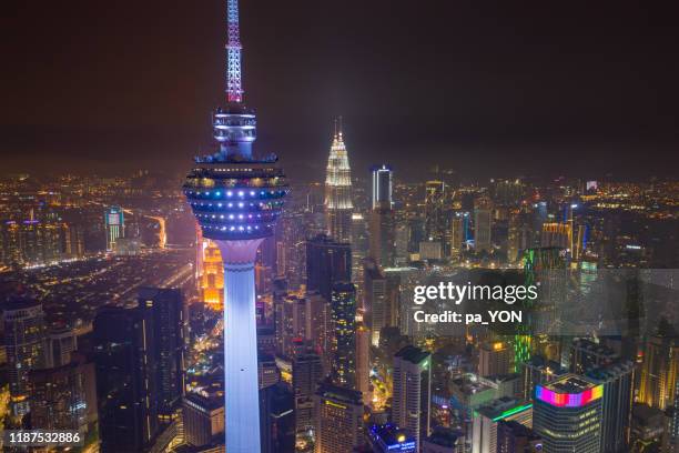 kuala lumpur skyscrapers building and city skyline at center of city downtown distinct in sunset evening time, kuala lumpur, malaysia - kuala lumpur road stock pictures, royalty-free photos & images