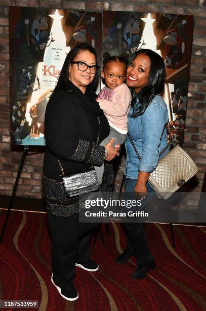 Actress Keshia Knight Pulliam poses with her daughter Ella Grace and her mother Denise Pulliam during Netflix's "Klaus" Atlanta screening at...