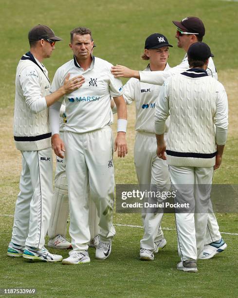 Peter Siddle of Victoria celebrates after dismissing Charlie Hemphrey of Queensland during day 3 of the Sheffield Shield match between Victoria and...