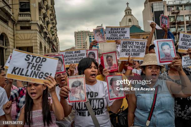 Relatives of drug war killings take part in a protest marking International Human Rights Day on December 10, 2019 in Manila, Philippines. On...