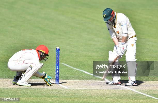 Unusual batting stance of George Bailey of Tasmania during day four of the Sheffield Shield match between South Australia and Tasmania at Adelaide...