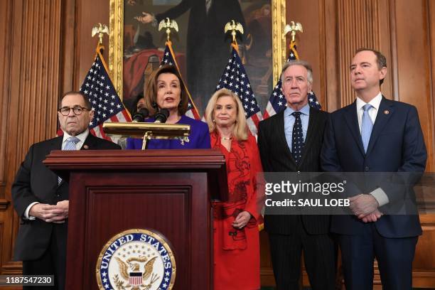 Speaker of the House Nancy Pelosi , flanked by House Permanent Select Committee on Intelligence Chairman Adam Schiff , House Judiciary Chairman Jerry...