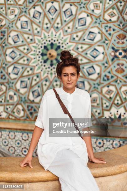 tourist woman sitting in morocco - moroccan culture stock pictures, royalty-free photos & images