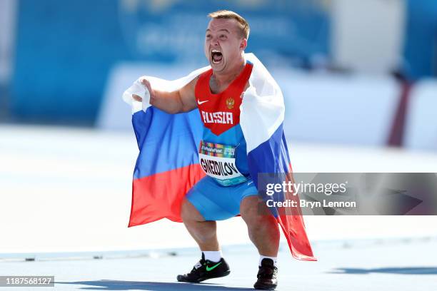 Denis Gnezdilov of Russia celebrates winning the Men's Shot Put F40 during Day Eight of the IPC World Para Athletics Championships 2019 Dubai on...