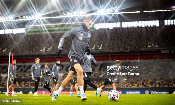 Toni Kroos kicks the ball during a German National Team training session at Merkur Spiel-Arena on November 14, 2019 in Duesseldorf, Germany. Germany...