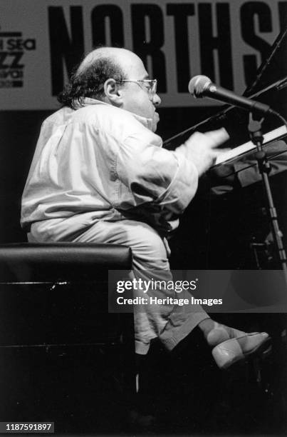 Michel Petrucciani, North Sea Jazz Festival, The Hague, Netherlands, 1998. Artist Brian Foskett.