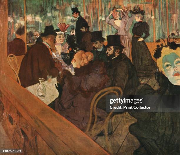 At the Moulin Rouge' . Scene in the Moulin Rouge cabaret in Paris: dancers Jane Avril , May Milton , and La Goulue in the background. Also seated at...