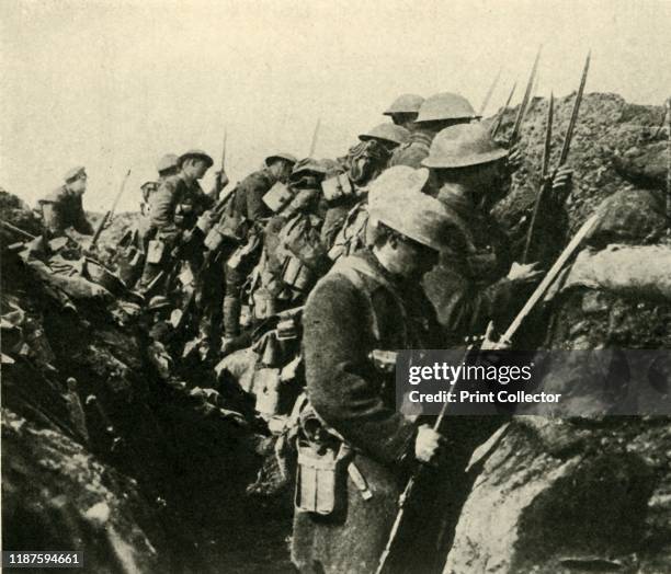 Canadian soldiers on the Somme, northern France, First World War, circa 1916, . 'Canada in the Trenches: fixing bayonets before an assault at...