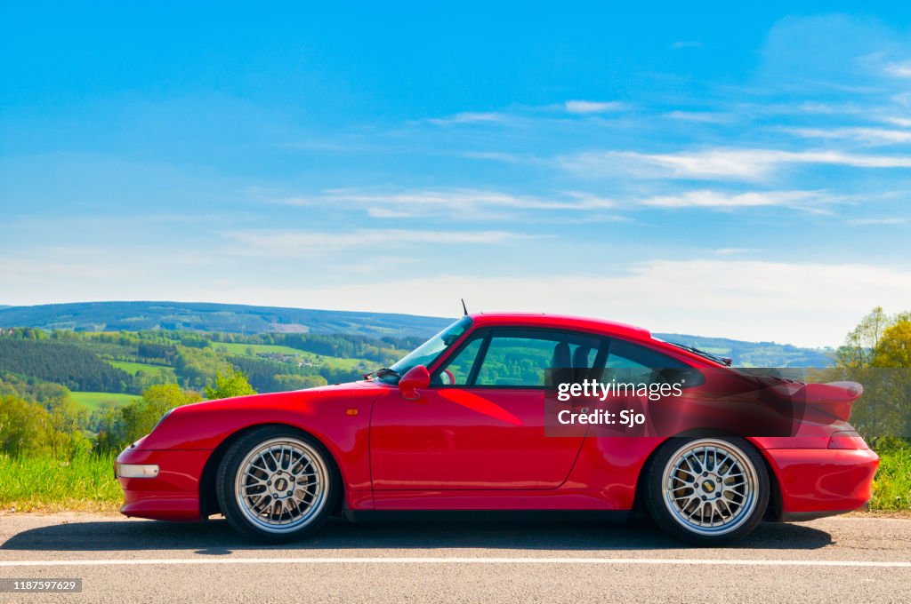 Porsche 911 Turbo in a rural landscape