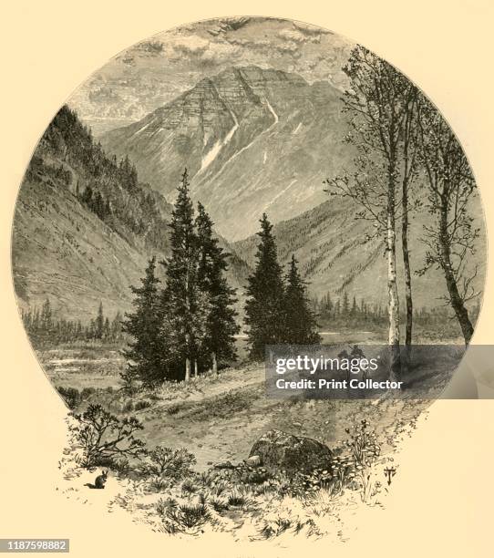 Teocalli Mountain', 1874. View of a peak in the Elk Mountains, part of the Rocky Mountain range, Colorado, USA. 'We pitch our tents near the base of...