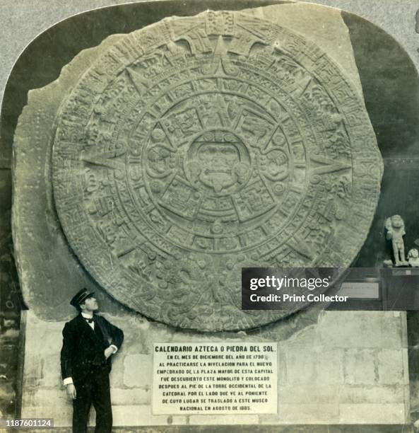 The Aztec Calendar Stone, or Stone of the Sun, National Museum, Mexico City', circa 1930s. A name glyph of Aztec ruler Moctezuma II suggests the...
