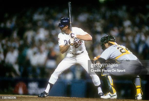Kirk Gibson of the Los Angeles Dodgers bats in the bottom of the ninth inning of game one against the Oakland Athletics during the 1988 World Series,...