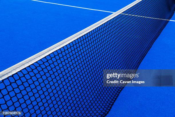 blue tennis court - tennis net stock pictures, royalty-free photos & images